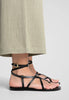 Flat leather sandals with straps