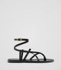 Flat leather sandals with straps